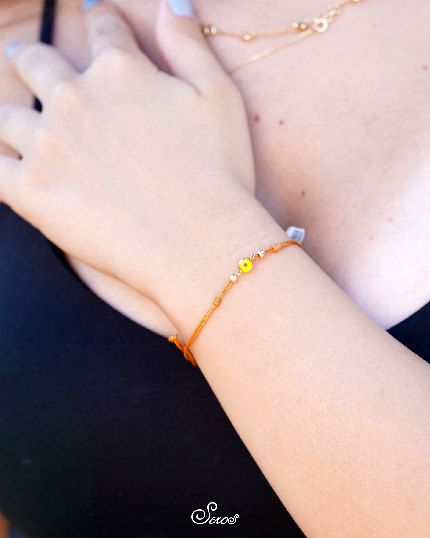 Gold Orange Eye Beaded Mustard Thread Bracelet